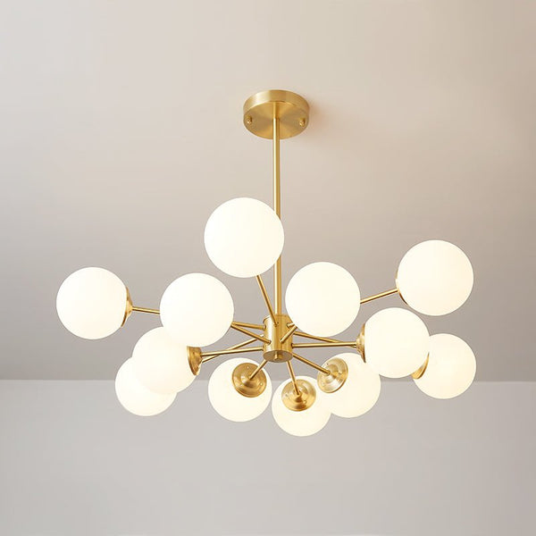 Highlighted by a stylish sputnik structure, this mid-century sputnik chandelier will add modern mid-century flair to any interior decoration. With an excellent combination of metal and opal globes, this brass sputnik chandelier with a two-tier design can bring brightness in different directions. Matched with opal glass shades and E26/E27 bulbs(not included), this mid-century modern lighting amazingly scatters the comfortable glow of the whole space.